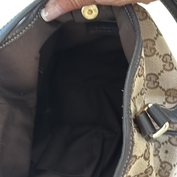 Gucci canvas, leather trim strap.  Very good condition. Almost like brand new - Picture 5 of 6